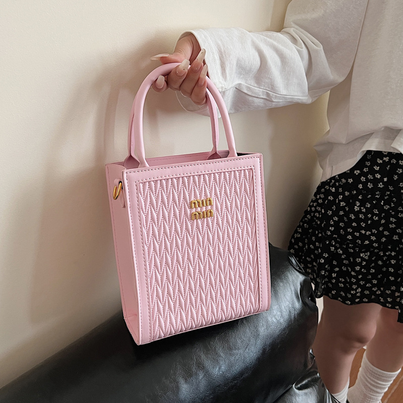 This year, the "Small Bag Women 2025" new trendy summer fashion, versatile and niche design hand-held shoulder crossbody bag is in vogue full figure