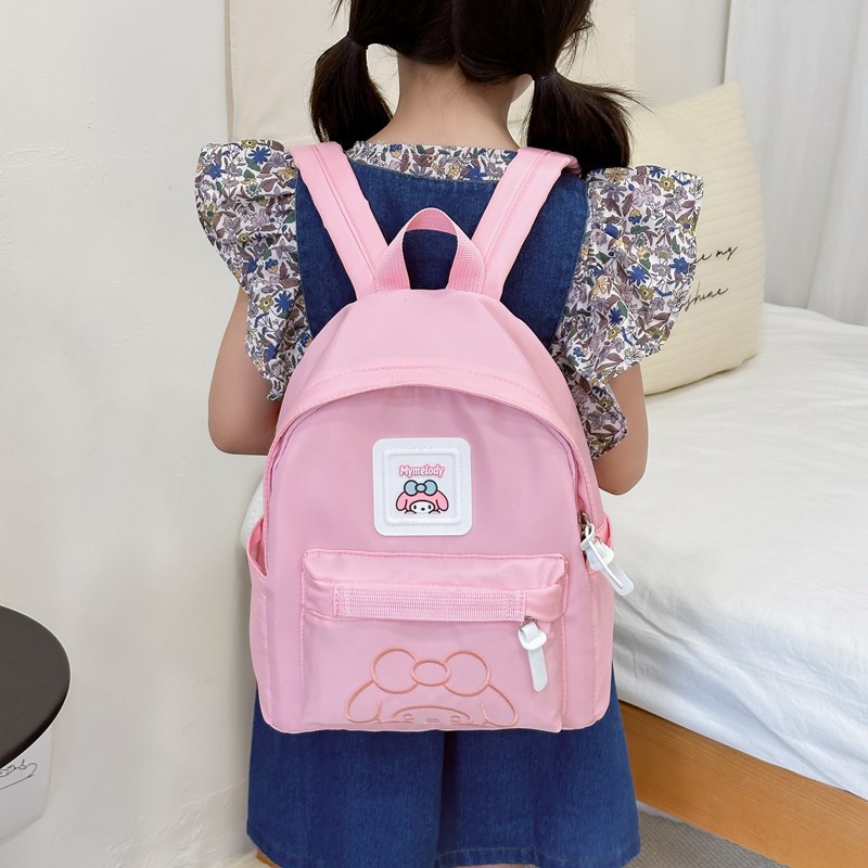 Simple and elegant Harajuku style pudding dog backpack, trendy boy's cool wide shoulder strap backpack with reduced load, kindergarten children's bag full figure