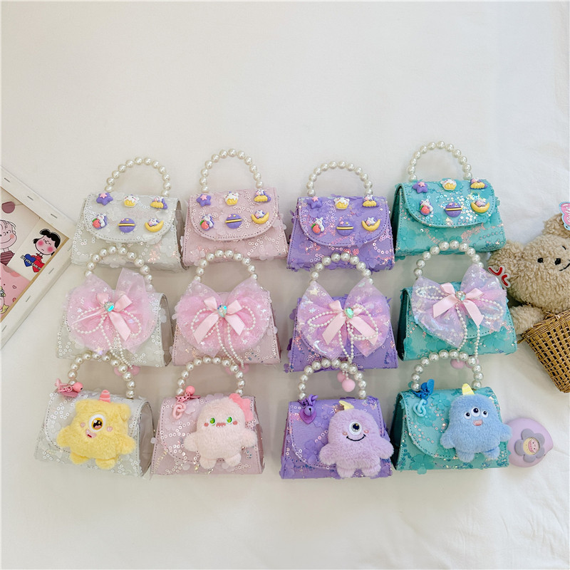 New cartoon princess children's bag, cute bow crossbody bag, fashionable little girl pearl hand shoulder bag full figure