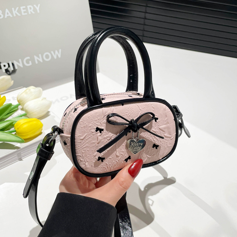 Pink bow bag 2025 Summer new style, niche and stylish design, underarm bag, mini single-shoulder crossbody bag full figure
