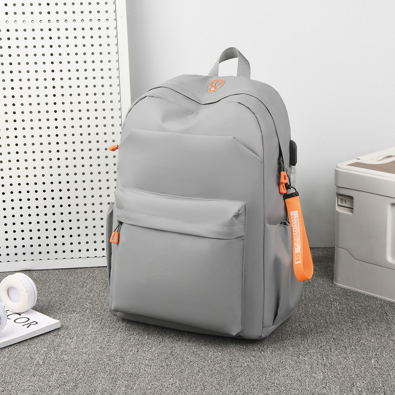 2023 New leather film backpack Summer Trend Men's and women's large-capacity student computer bag school bag full figure