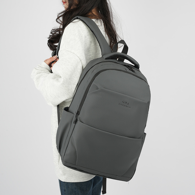 New men's backpack, a universal large-capacity laptop bag for business trips, and a simple and casual travel backpack full figure