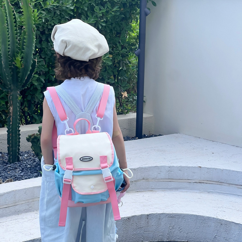New fashionable color-blocking children's, boys' and girls' casual and cool baby travel backpack, kindergarten schoolbag full figure