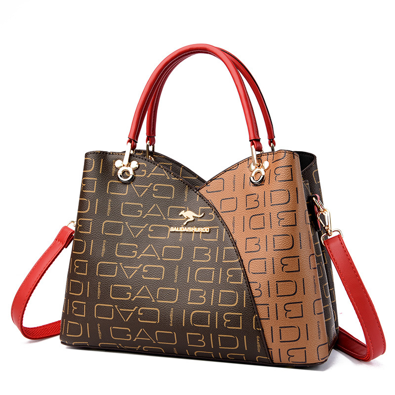 The 2023 new women's bag with a patchwork geometric design is a simple and versatile handbag for middle-aged mothers with a large capacity and a single shoulder bag for women Item Picture