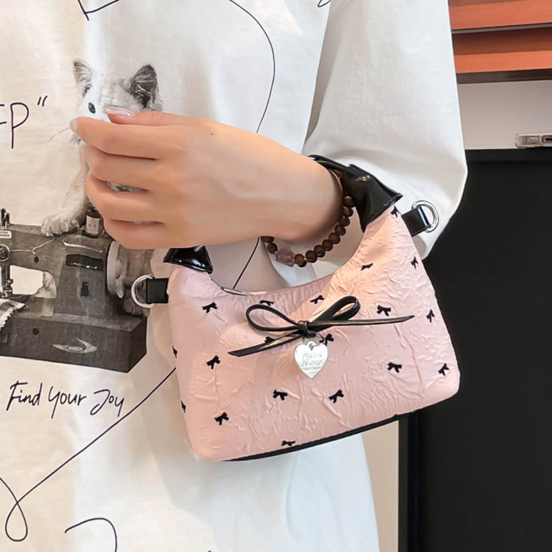 A versatile bow-shaped crossbody bag for women, a simple Korean-style handbag, a new summer 2025 fashionable dumpling bag Specification drawing