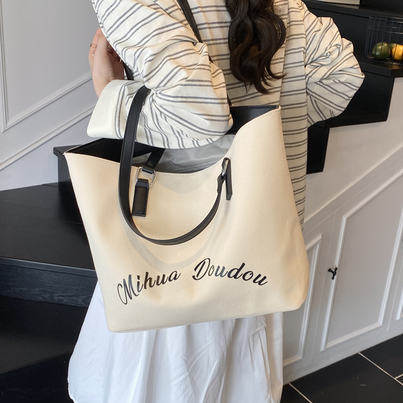 The new 2025 summer collection features a patchwork color-blocking canvas bag, a casual large-capacity single-shoulder bag, and a fashionable embroidered commuter tote bag Specification drawing
