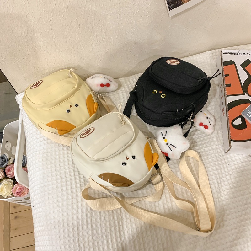 Little cat small schoolbag, cute and funny backpack for high school and college students, cartoon girls' backpack 2024 New style Application Scenario