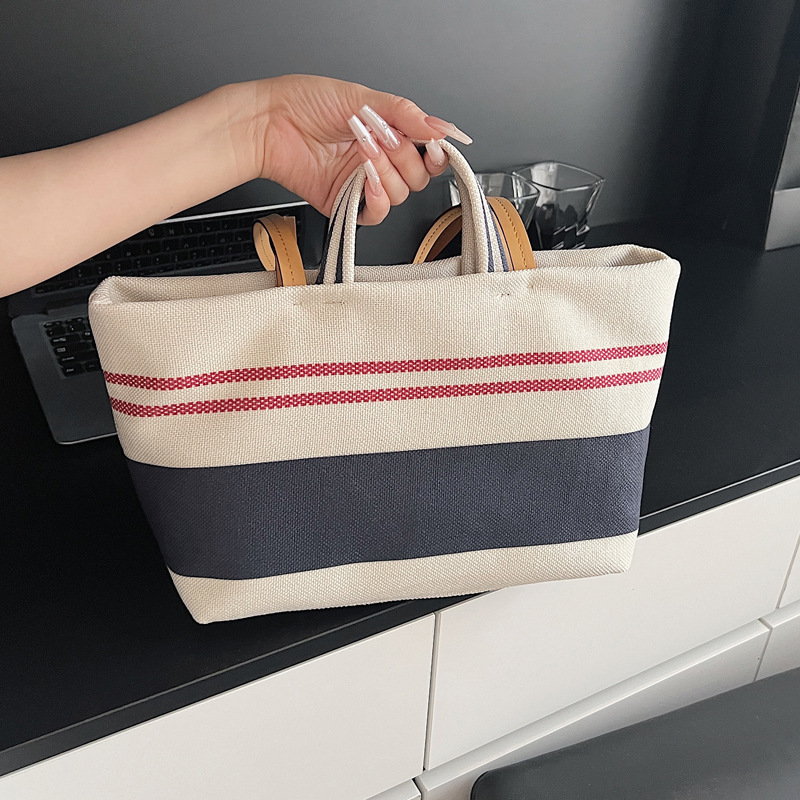 2025 Summer new beach bag shopping bag, hand-held laid-back style, fashionable and simple woven fabric bag, single-shoulder tote bag full figure