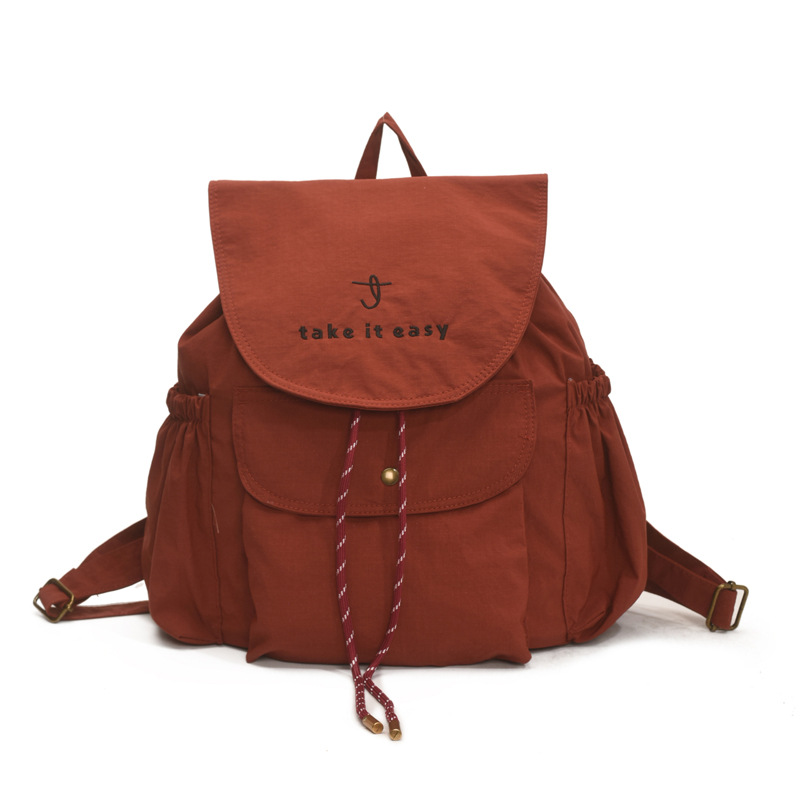 A new 2025 lightweight and versatile women's backpack made of nylon fabric for casual travel Item Picture