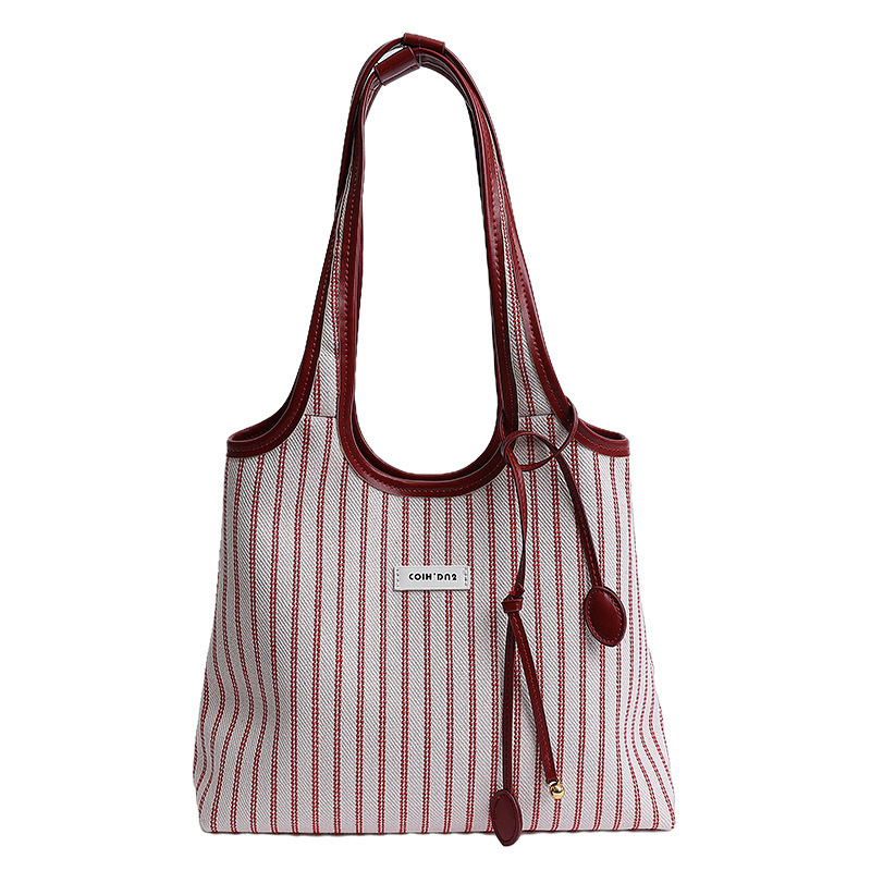 2025 Casual Commuter Tote bag, women's niche striped simple and fashionable hand-held shoulder bag, large-capacity underarm bag Item Picture
