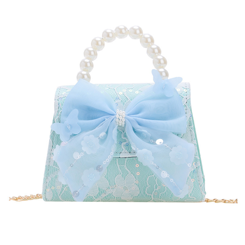 Cute little Chanel-style princess girl's small bag, pearl hand-held chain crossbody bag, children's bow single-shoulder bag Item Picture