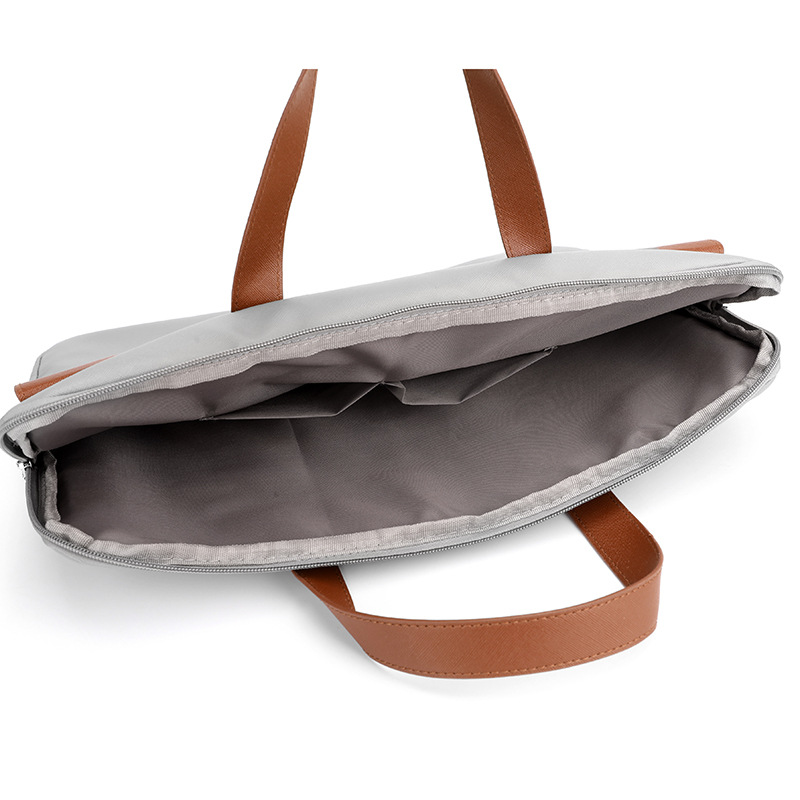 Wholesale new 15.6-inch solid-color laptop bags, 14-inch notebook bags, and color-blocked portable document briefcases Application Scenario