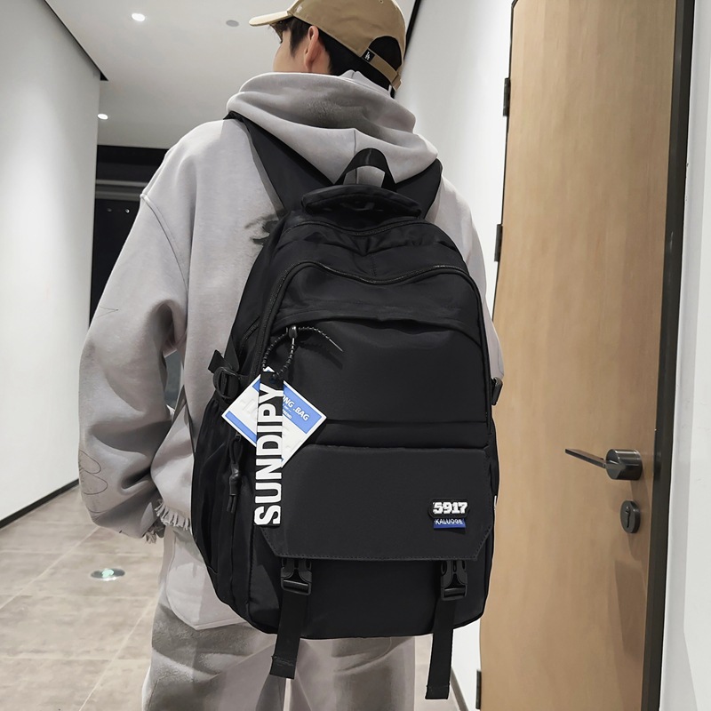 A new color-blocking computer backpack for girls in the college style, a large-capacity backpack for boys in street fashion Specification drawing