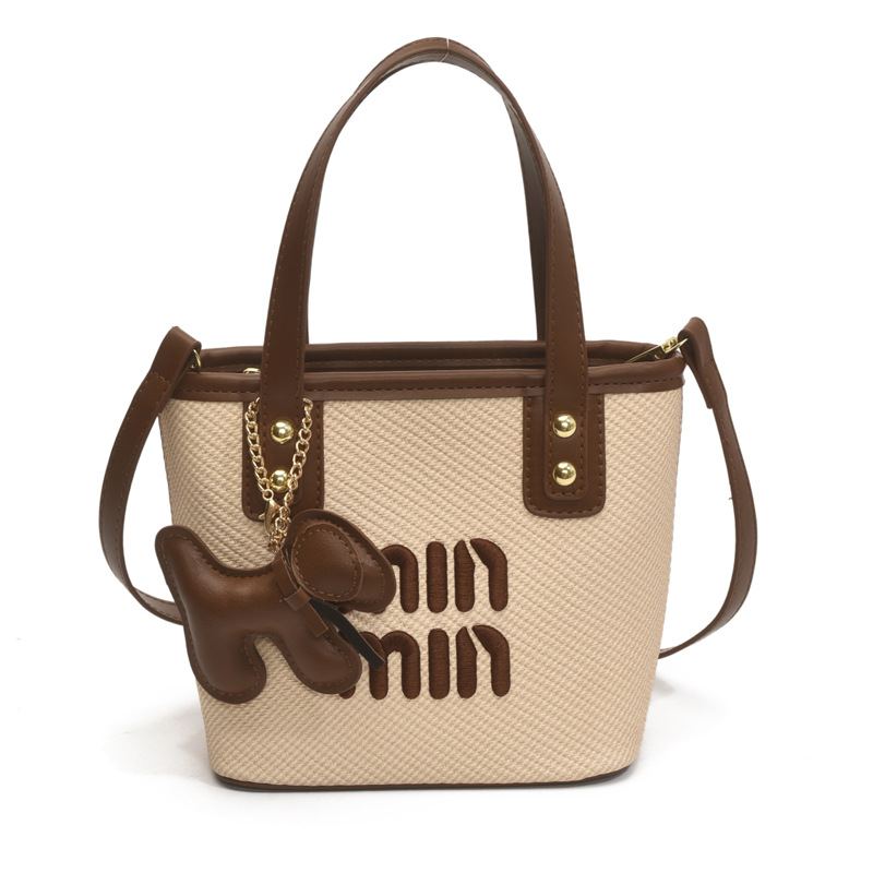 This is a trendy and niche design hand-held bucket bag for women in the summer of 2025. It is a versatile and casual crossbody bag Item Picture