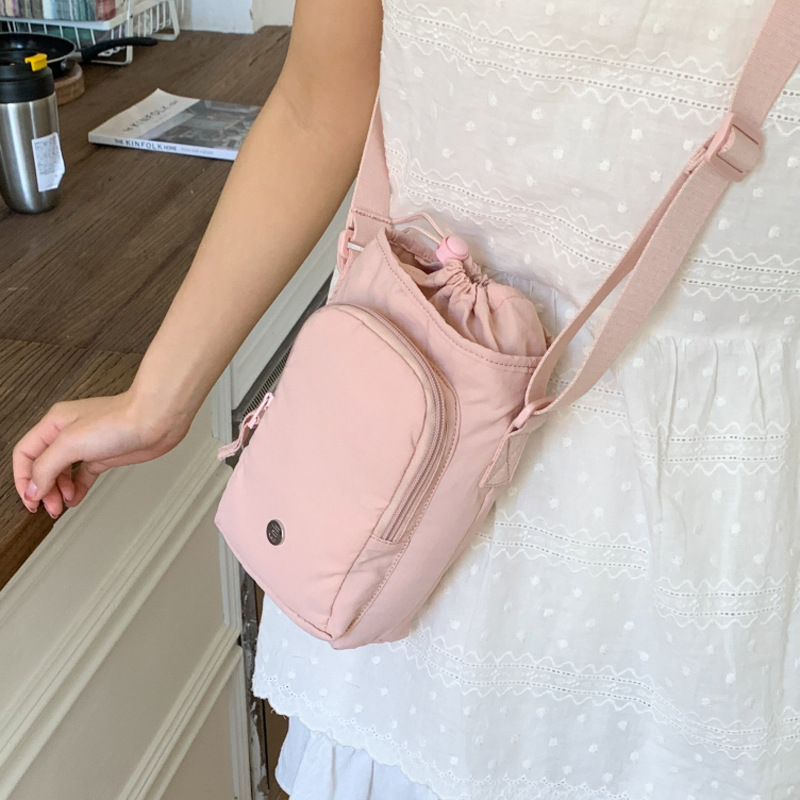 Outdoor portable casual mini single-shoulder bag, simple and versatile drawstring bucket bag, Korean style Instagram niche crossbody women's bag Application Scenario