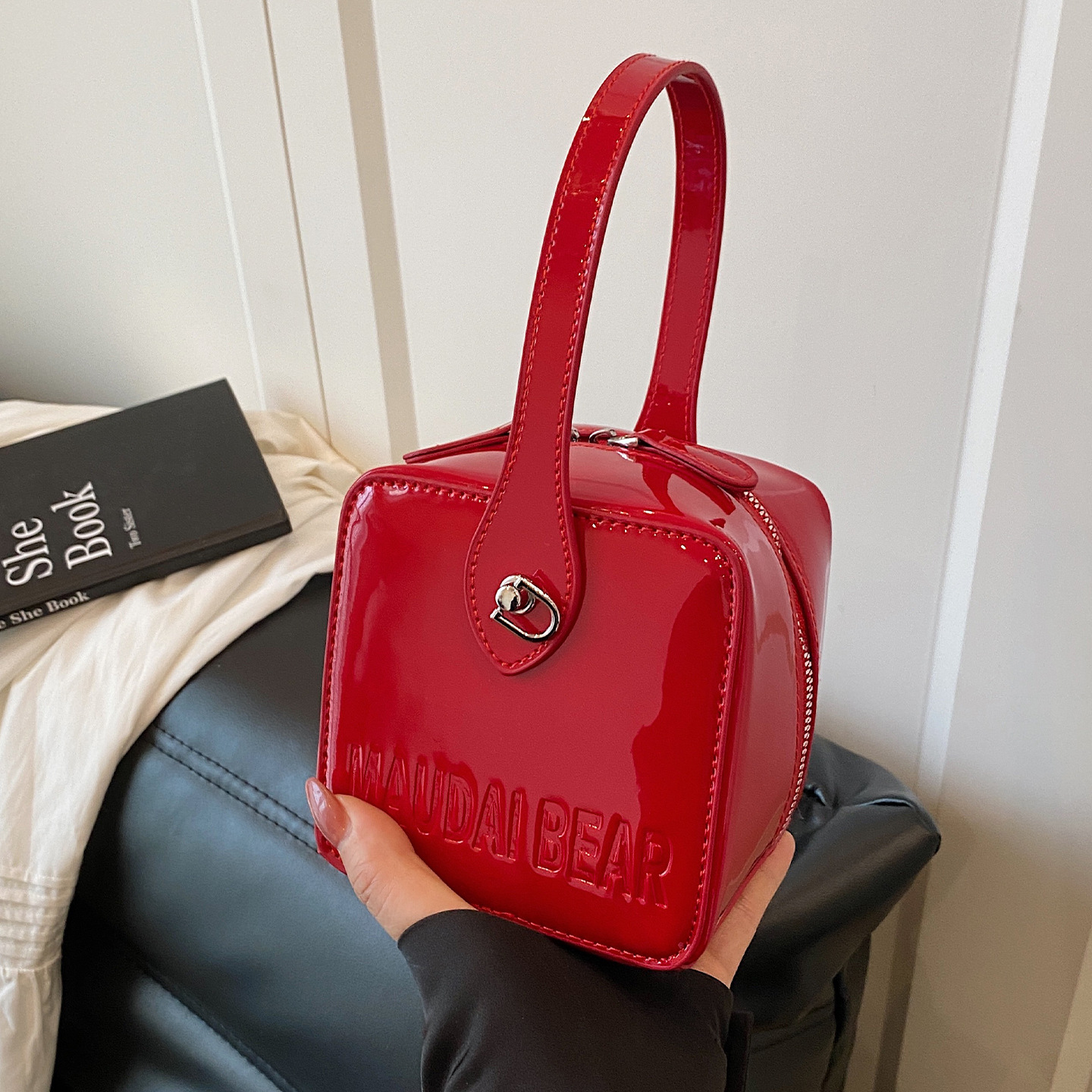 A new trendy and stylish handbag for women in 2025, featuring a red single-shoulder crossbody small square bag full figure
