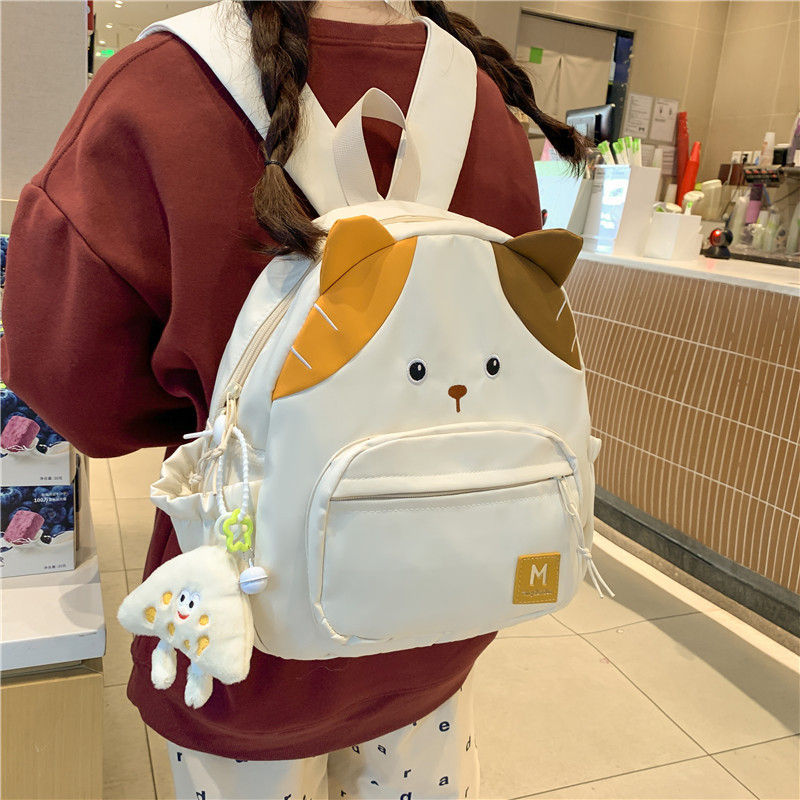 Cute cartoon kitten backpack, sweet schoolbag with a girl's school style, large capacity and versatile student storage backpack full figure
