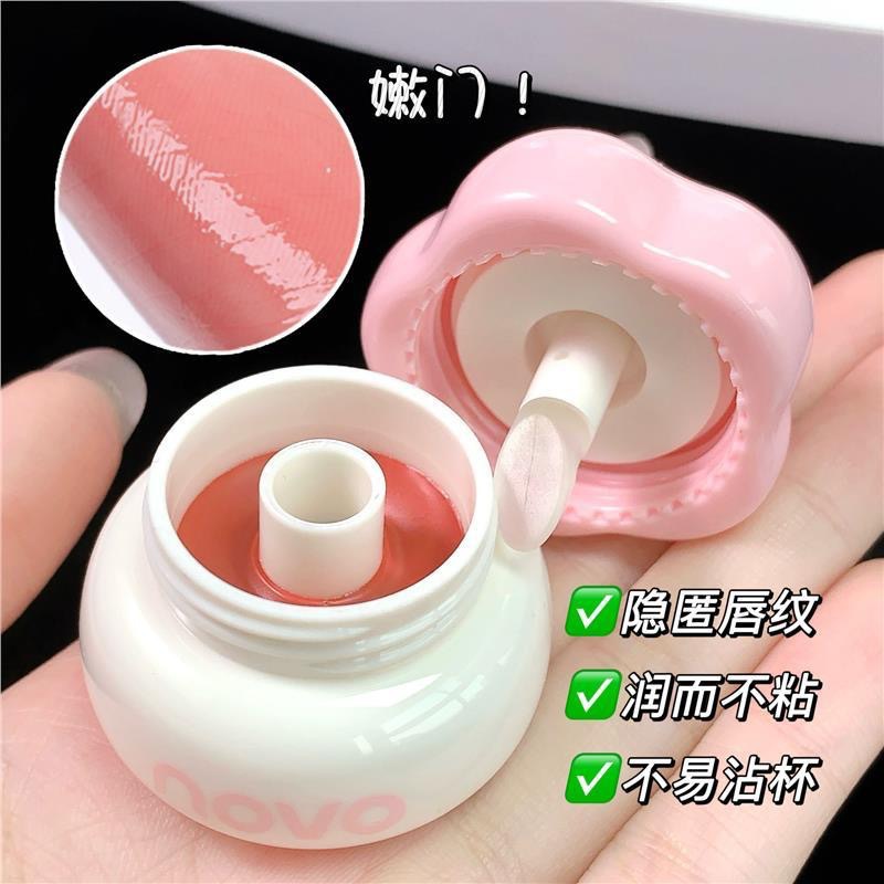 NOVO Sweetheart Milk Jelly Can Lip Gloss is a student affordable lipstick that makes you look fair without makeup and doesn't stick to cups. It's a mirror water gloss lip gloss full figure