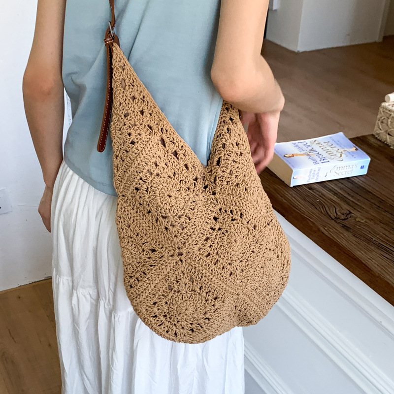 2025 Korean version new woven bag, ins style artistic woolen bag, single-shoulder bag, seaside vacation hollowed-out beach bag details Picture