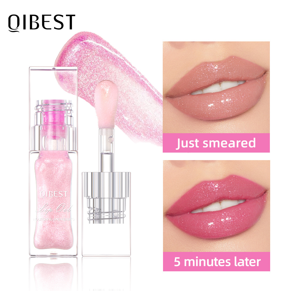 QIBEST Cross-border Thermochromic Lip Oil is moisturizing, easy to color, nourishing and does not stick to the cup. It is a lip gloss that makes the lips look bright and colorful full figure