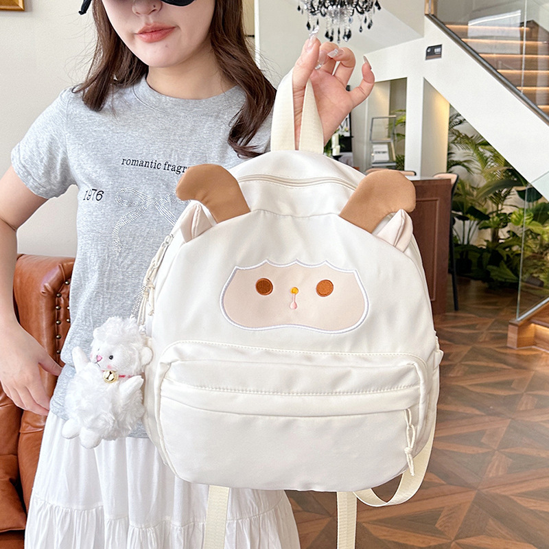 This cartoon little lamb children's backpack is a refreshing and cute summer bag with a girlish heart. It's a versatile student bag with a large storage capacity and is adorable details Picture