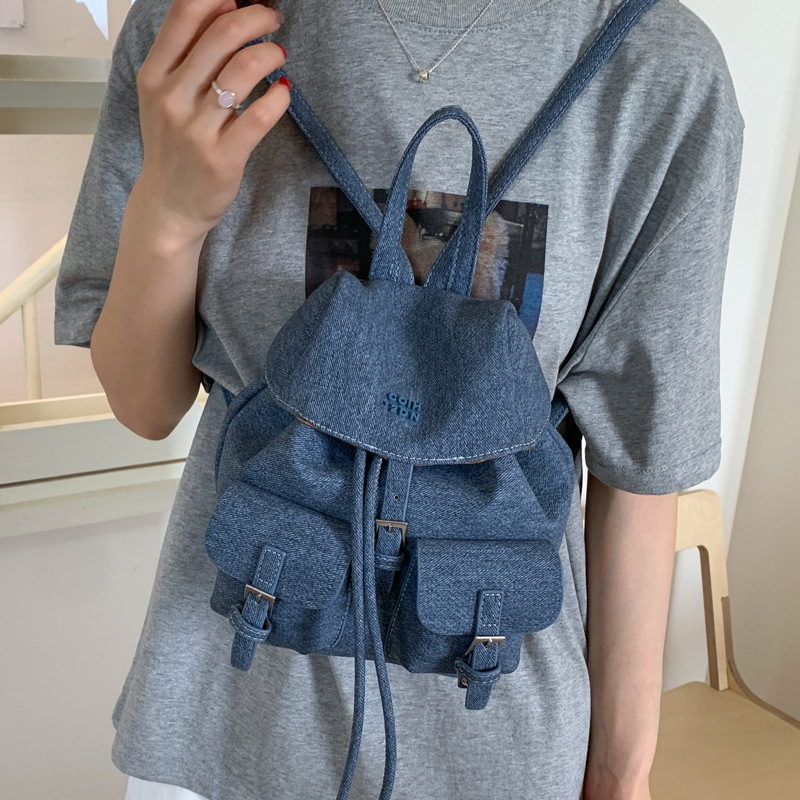 "College Style 2025 New Korean-style stylish mini Backpack, double pockets, lid style backpack, casual travel bag. Application Scenario