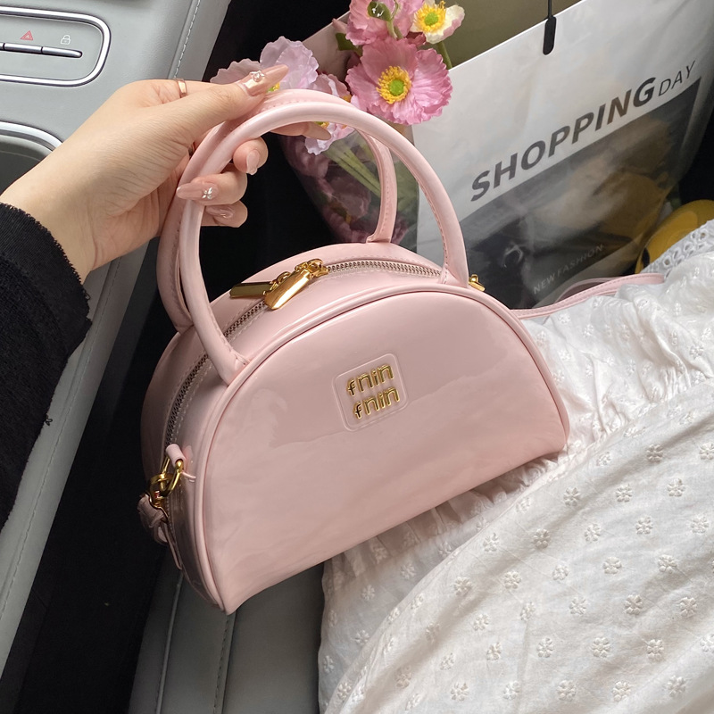 Simple and casual hand-held shell bag for women, 2025 new style versatile single-shoulder crossbody bag, dumpling bag, semi-round moon bag full figure