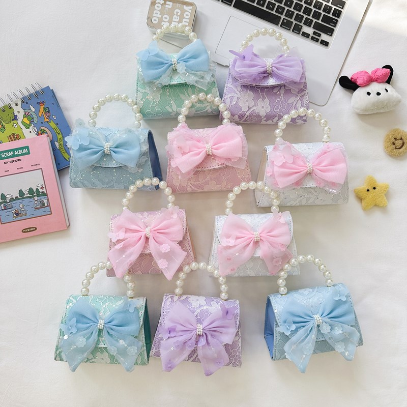 2024 New children's bags, crossbody bags, fashionable pearl handbags, lace bows, girls' and princesses' accessory bags full figure