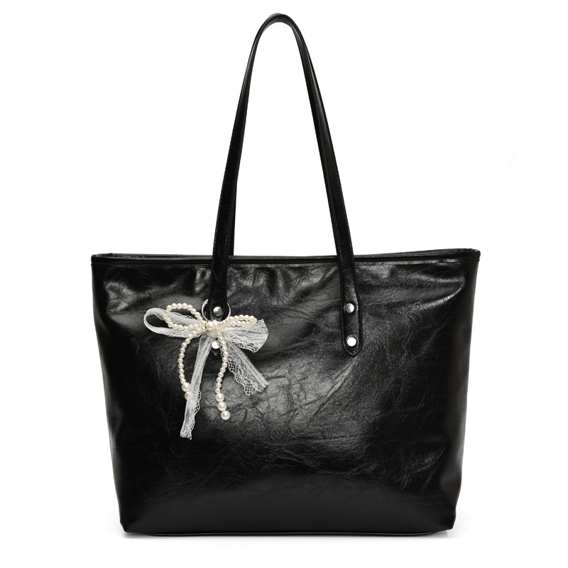 The 2025 summer new stylish and simple tote bag is a casual and trendy large-capacity tote bag with a niche design for women Item Picture