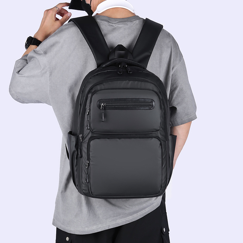 Cross-border wholesale of new large-capacity, simple commuting computer bags, school bags for junior and senior high school students, foreign trade backpacks for men, Korean version details Picture