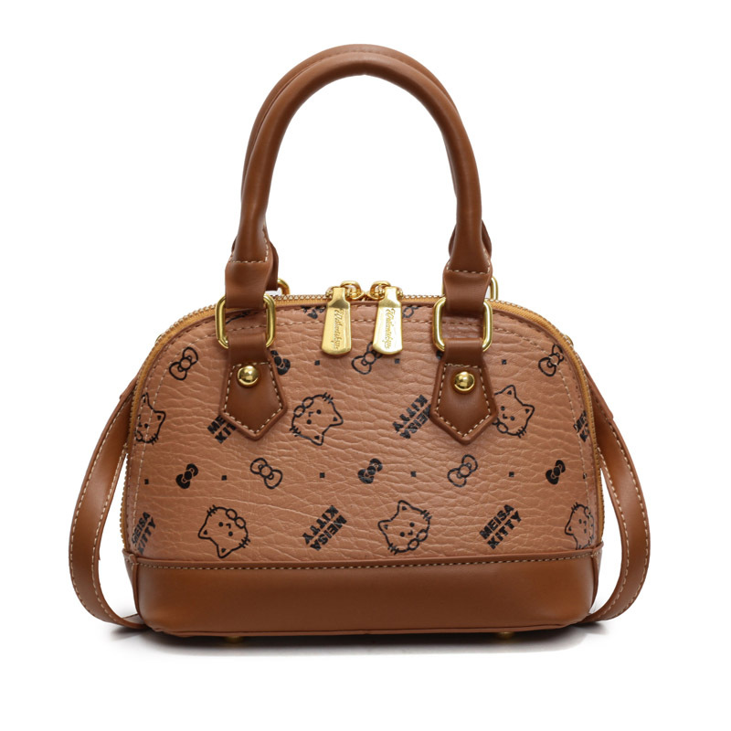 A cute girl carrying a 2025 new Korean cartoon printed single-shoulder bag is a fashionable, niche and casual women's bag Item Picture
