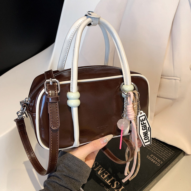 Korean retro niche hand-held bowling bag, Spring 2025 new solid color single-shoulder crossbody bag, elegant handbag Specification drawing