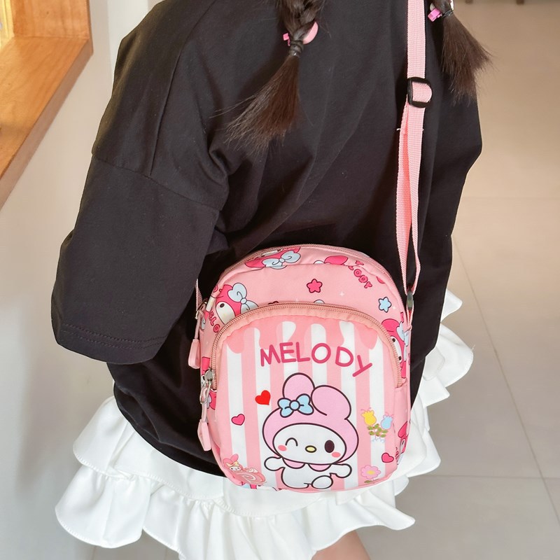 The new children's bag is a cute cartoon girl's coin purse that can hold a mobile phone. It's a fashionable single-shoulder crossbody bag for little girls to go out details Picture