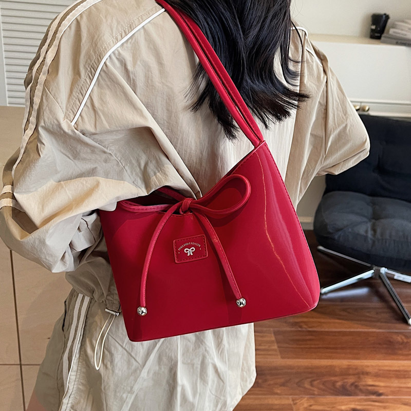 Women's fashion bucket bag 2025 new retro handbag, bow single-shoulder bag, solid color versatile underarm bag details Picture