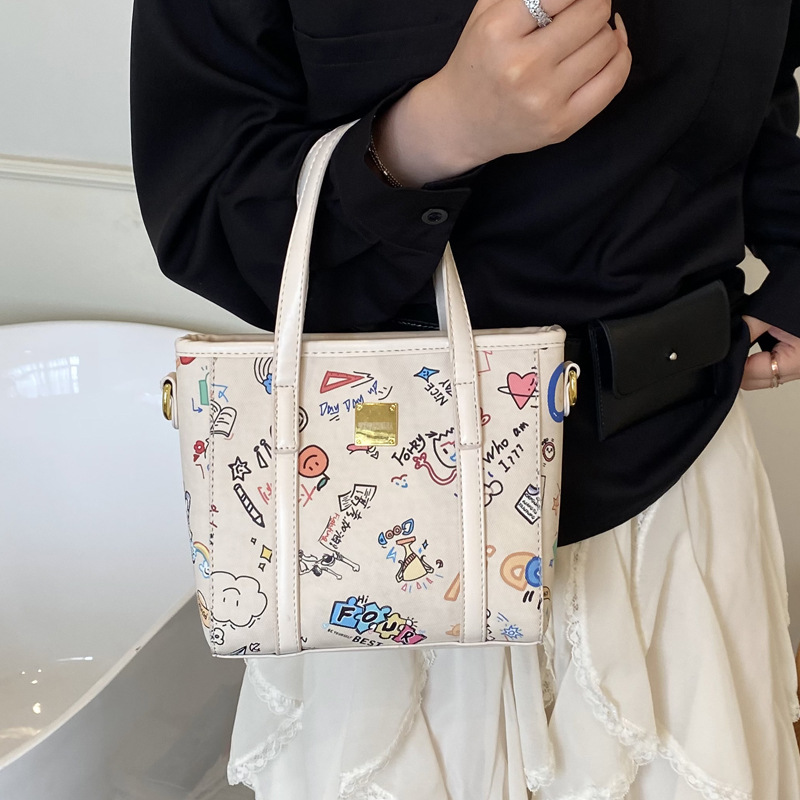 Fashionable and niche design single-shoulder crossbody bag for women 2025 new cartoon printed hand-held bucket bag with pendant Specification drawing