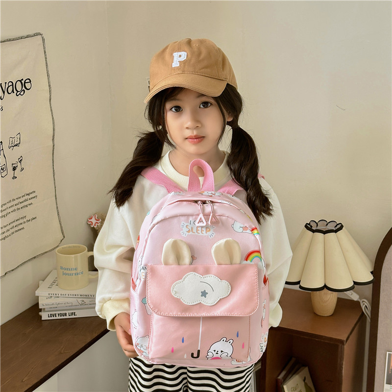 New kindergarten schoolbags for small and middle classes, cute cartoon cloud rabbit children's backpacks for export full figure
