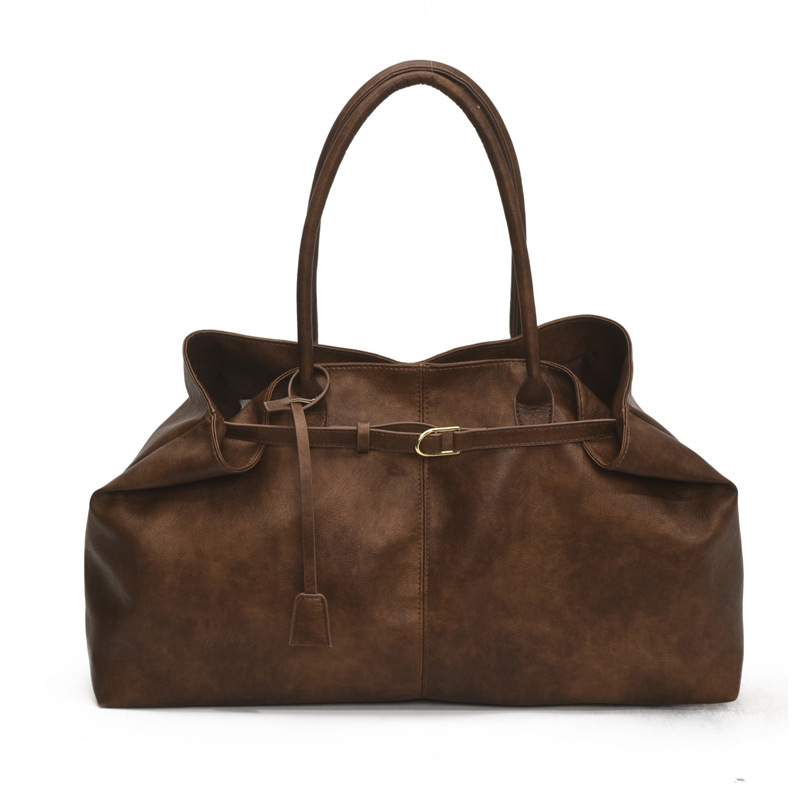 The laid-back style large-capacity underarm tote bag for women in 2025, with a lock, is fashionable and versatile. It's a trendy single-shoulder bag for commuting Item Picture