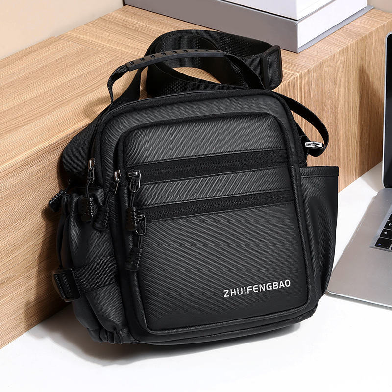 A fashionable and trendy single-shoulder crossbody bag for men engaged in foreign trade, multi-layered storage, water-resistant Oxford fabric handbag details Picture