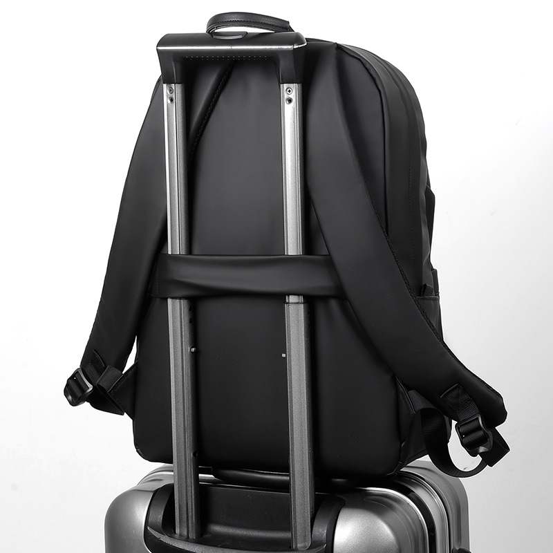 A new minimalist backpack for men, a Korean-style casual and fashionable backpack for laptops, with a logo printed on it Specification drawing