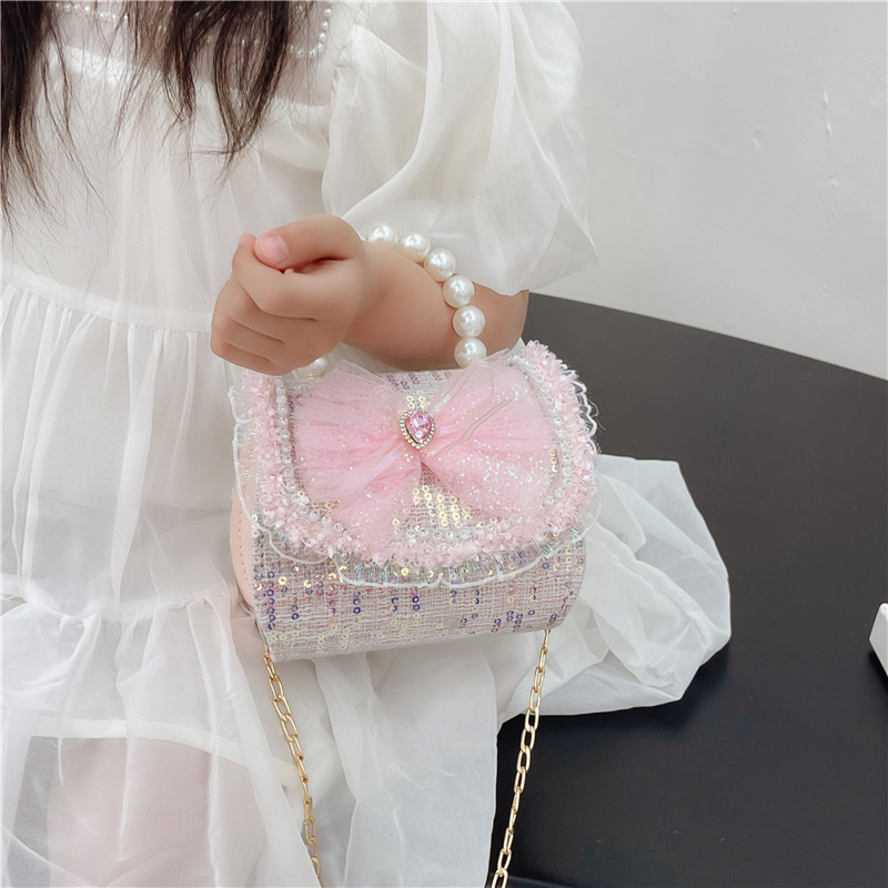 New children's bags, summer fashion crossbody bag, girl pearl hand-held princess bag, chanel-style coin purse Application Scenario