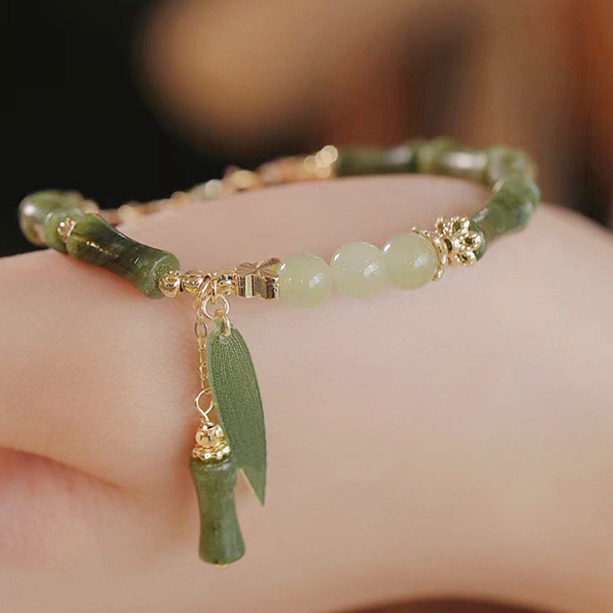 A retro Chinese-style olive jade bamboo joint bracelet for women, with a unique design and simple charm. A new Chinese-style Hetian jade bracelet for women, 253 Specification drawing