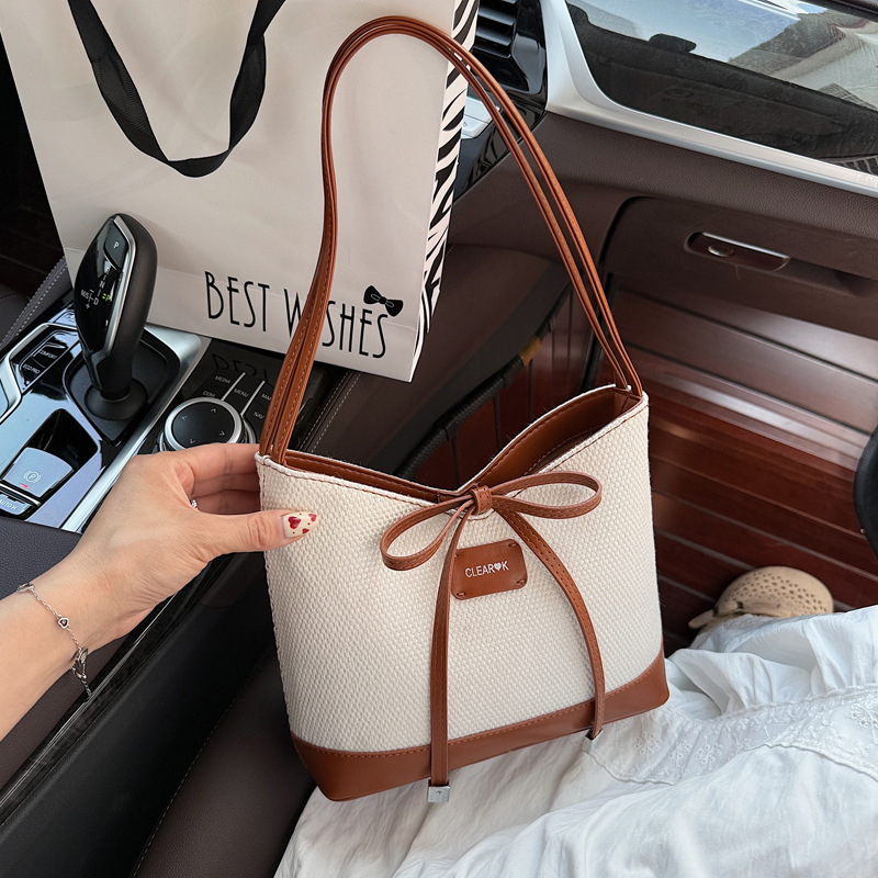 Simple and large-capacity tote bag for women 2025 new style in a two-color Korean-style casual underarm bag with a bow, fashionable and sweet full figure