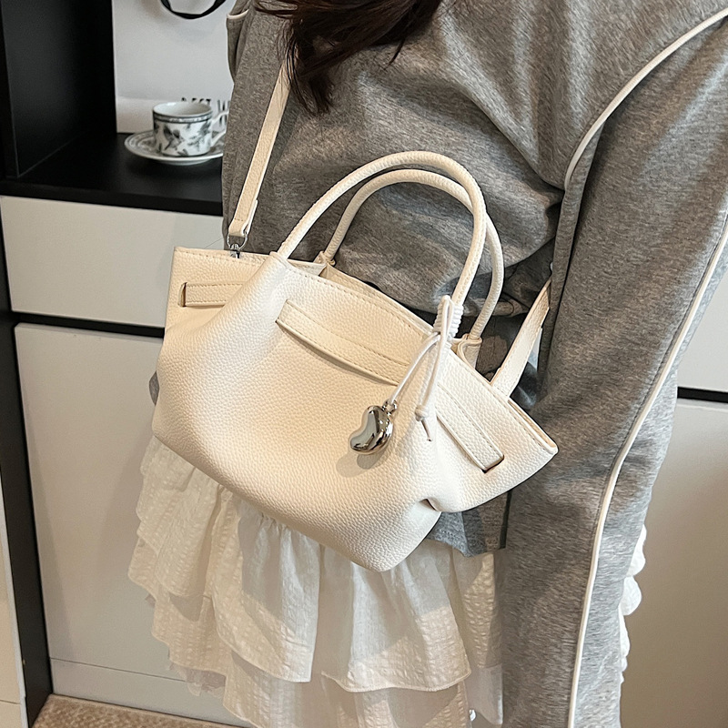 Hand-held bucket bag, women's bag, Korean retro 2025, trendy and fashionable texture, casual single-shoulder bag, commuter crossbody bag details Picture