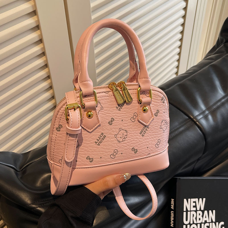 A cute girl carrying a 2025 new Korean cartoon printed single-shoulder bag is a fashionable, niche and casual women's bag Application Scenario