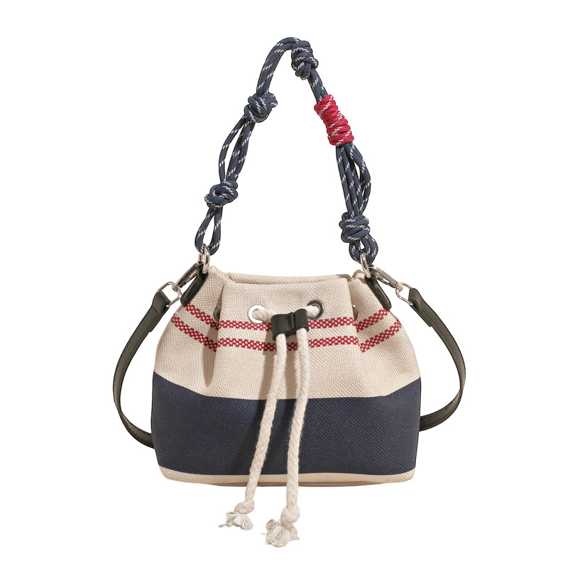 This year, the popular niche design bags are the 2025 new women's versatile canvas crossbody bag and the color-blocking hand-held bucket bag Item Picture