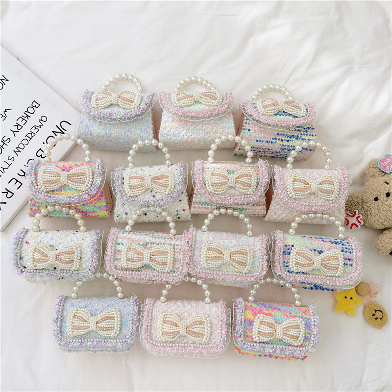 Spring 2025 New sequined pearl bow girl princess hand-held crossbody accessory loose change bag details Picture
