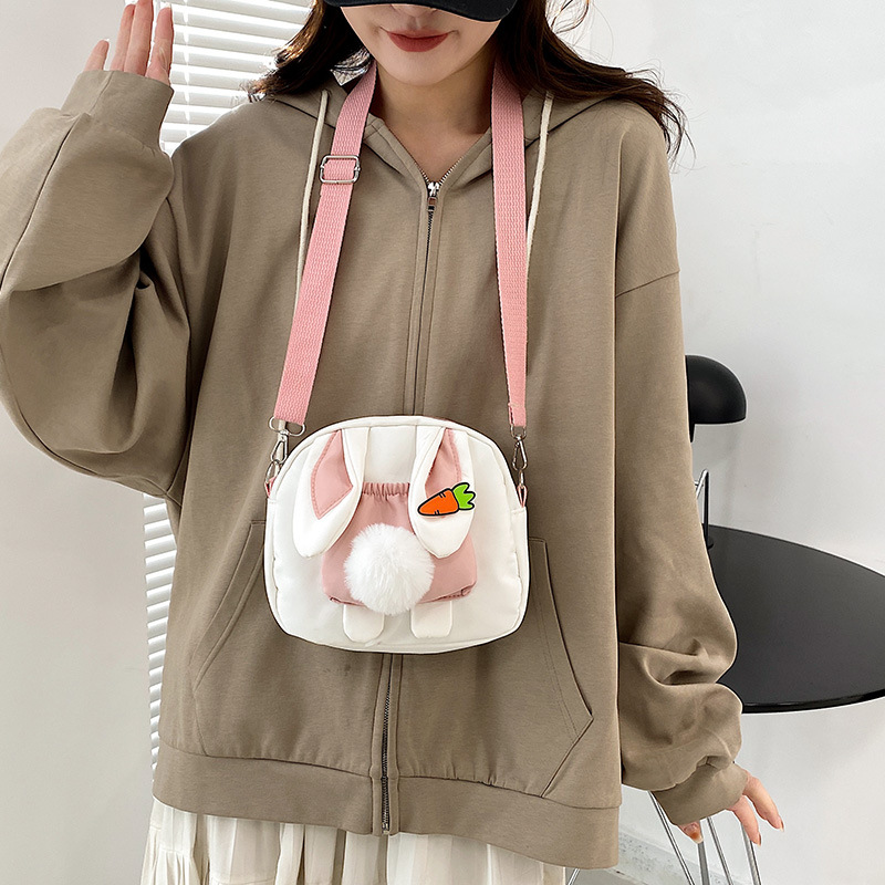 A new 2022 spring collection of fashionable, cute, trendy and unique rabbit color contrast simple and fresh single-shoulder crossbody bag for young girls details Picture