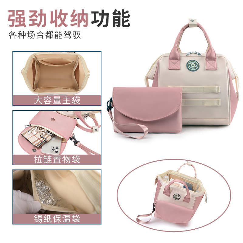 The Mommy bag is small and cute. It has a detachable front pocket and is a multi-functional baby bag. It is waterproof, lightweight, and has a crossbody design. It can be used to carry milk bags details Picture