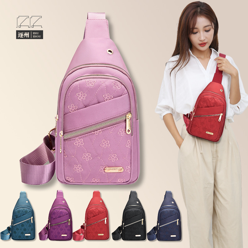 The new women's embroidered nylon crossbody bag is fashionable and versatile. The embroidered checkered chest bag is a simple and everyday outdoor travel bag for women full figure
