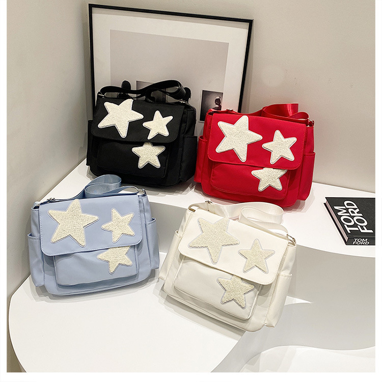 Cross-border wholesale large-capacity five-pointed star canvas single-shoulder bag, cute school style crossbody bag, student commuting bag for classes full figure